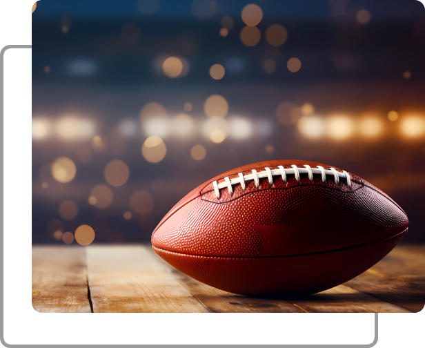 A football sitting on top of a wooden table.